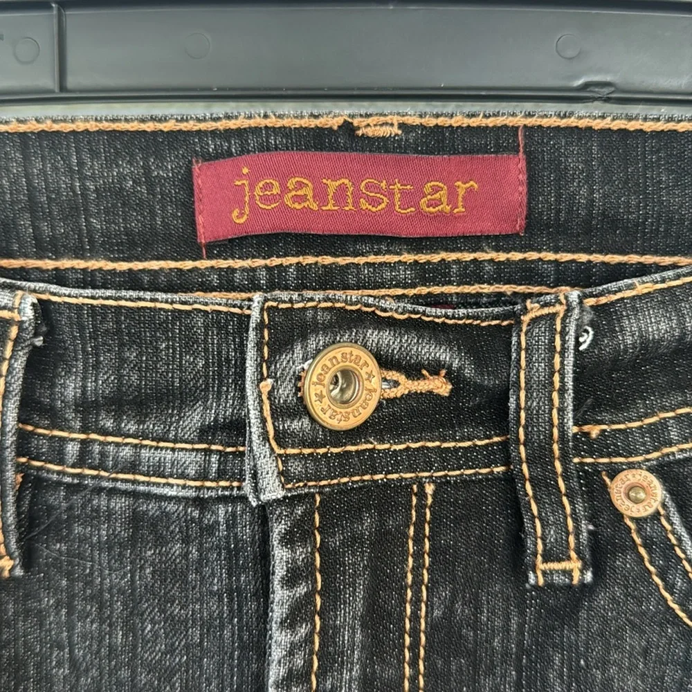 Jeanstar dark wash mid rise flare leg cotton stretch jeans size 4 short